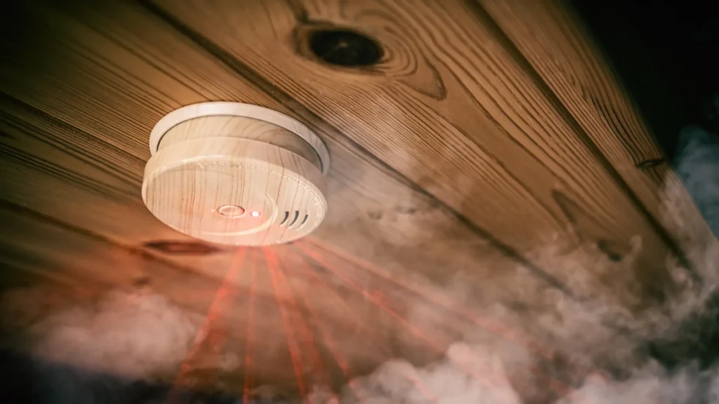 a smoke alarm detecting smoke in a Townsville rental property